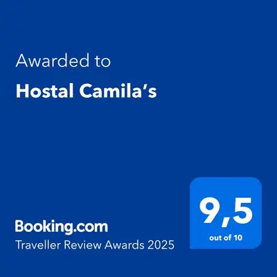 a blue text box with the words awarded to hospital canillas at Hostal Camila’s in Tamanique