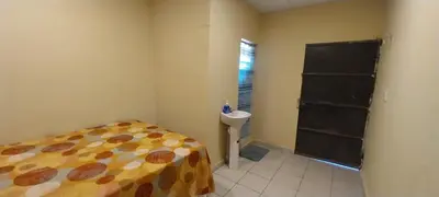 a bedroom with a bed and a sink and a toilet at Hostal San José in La Unión