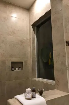 a bathroom with a sink and a mirror at Casa Degraciela - Hotel Boutique in Concepción de Ataco