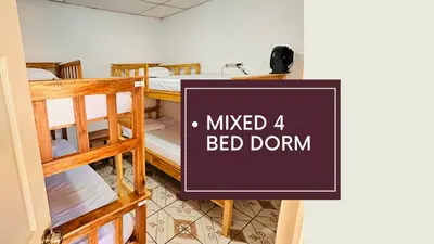 a room with bunk beds and a sign that reads killed bed donut at Hostal Villa Marta in Santa Ana