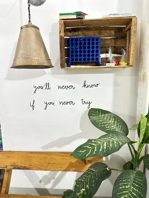 a sign that says youll never know if you never try at Hostal Villa Marta in Santa Ana