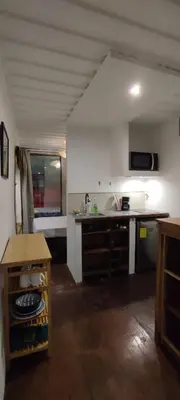 a kitchen with a sink and a counter top at CASA V - Mizata in Santa María Mizata