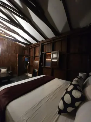 a bedroom with a large bed with pillows on it at Bosko cerro verde in Lomas de San Marcelino