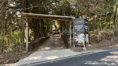 a sign on the side of a road at Bosko cerro verde in Lomas de San Marcelino