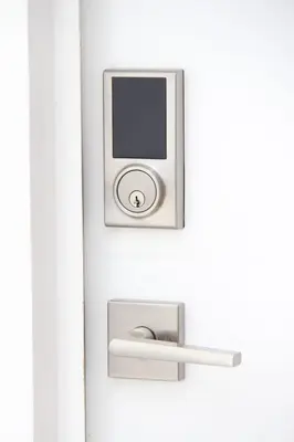 a door with a safe and a mirror on it at Casa flores Residencial Privada Nueva San miguel in San Miguel