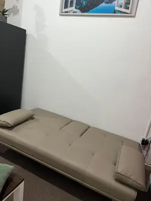a bed in the corner of a room at Dream of angels home in Santa Ana