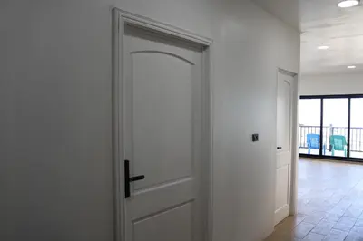 a white door with a black handle in a room at Casa Francisca in Alegría