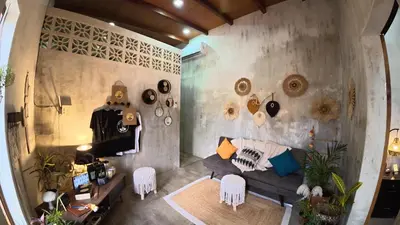 a living room with a couch and a table at 3 Family Villa Private Pool Parking BBQ El Sunzal El Tunco El Zonte SURFCITY in Tamanique
