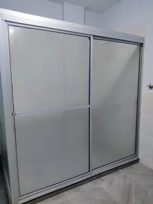 two sliding glass doors in a room at Rancho Del Oso Tuerto in Marcelino