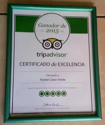 a framed picture of a sign for the carabiner de triapçessor at Hostal Casa Verde in Santa Ana