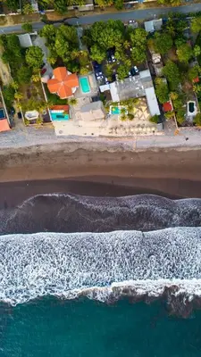 an aerial view of the beach and the ocean at Barú in La Libertad
