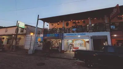a truck parked in front of a building at Casaca in Concepción de Ataco