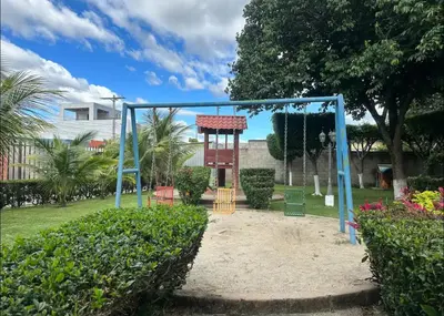 a playground in a park with a swing at Apartamento entero Rebeca house in Santa Ana