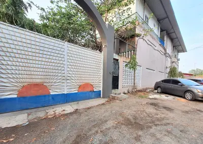 a car parked in a parking lot next to a fence at Coastal Paradise Estudio Cerca de Sunset Park y Playa in La Libertad