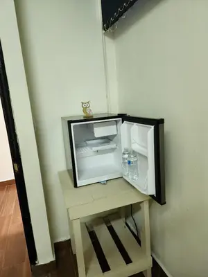 a small tv sitting on a table in a room at GYWEL 1214 in San Salvador