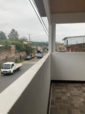 a view of a street from the balcony of a house at Vacacional Abril in Juayúa
