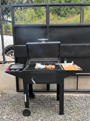 a grill on a table with food on it at Shalpabay - Rooms in Taquillo