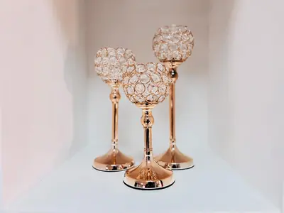 a group of three wine glasses on a wall at Hotel San Angelo in Concepción de Ataco