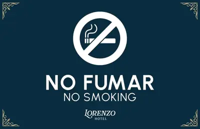 a sign that says no trump no smoking at Lorenzo Hotel in San Salvador