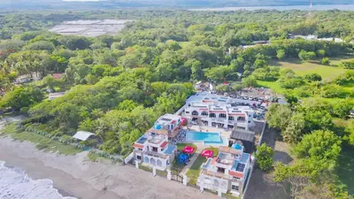 an aerial view of a house on the beach at Mariposa Reina A in El Tamarindo