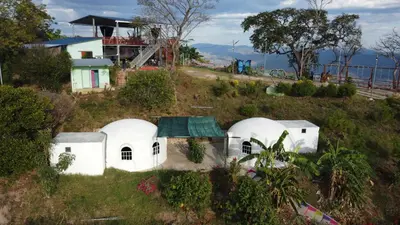 an aerial view of a house on a hill at Las Terrazas de el Alto in Chalatenango