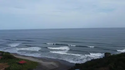 an aerial view of the ocean with waves at Surf Lodge El Carrizal-Punta Mango in La Periquera