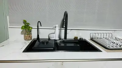 a kitchen sink with a black counter top at Muy cerca de playas y miradores muy accesible a la ciudad y comercios in La Unión