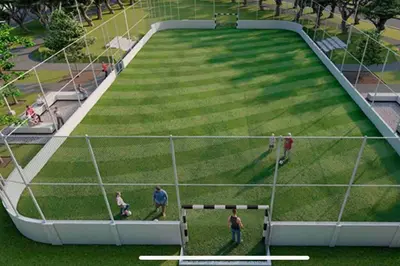 a group of people standing on a soccer field at Tiny but cozy home in Santa Ana in Santa Ana