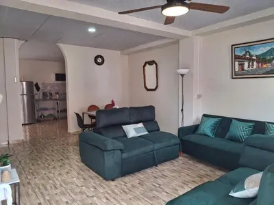 a living room with two couches and a couch at Casa Centro Histórico Santa Ana in Santa Ana