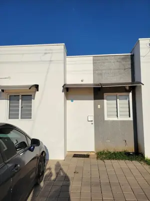 a car parked in front of a house at Toto's House, near Mall Las Ramblas in Santa Ana