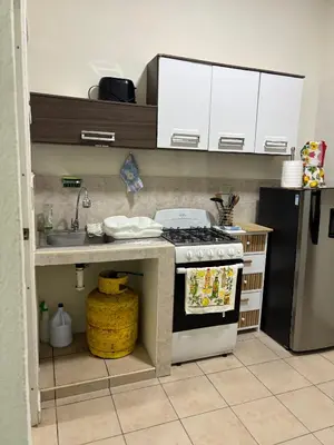 a kitchen with a stove and a sink at La Casita de Vacaciones in San Miguel