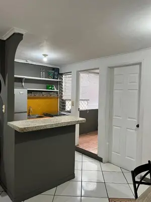a kitchen with a sink and a counter top at Todo cerca Apartamento Familiar en el corazón de San Salvador in San Salvador