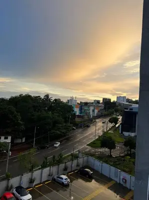 a view of a city with cars parked on a street at Tower View 360º in San Salvador