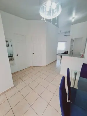 a room with white walls and a tiled floor at casa familiar, HOME sweet HOME san Miguel