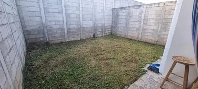 an empty backyard with a wall and a stool at Residencia en Megápolis, San Miguel in San Miguel