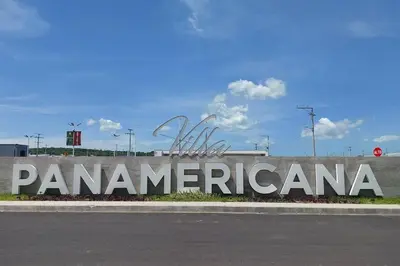 a sign that says panamerica on the side of a wall at Confort Express en San Miguel in San Miguel