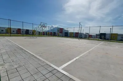 an empty basketball court with a basketball hoop at Confort Express en San Miguel in San Miguel