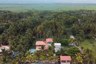 an aerial view of a resort with palm trees at Casa De Playa Atlantis in San Luis