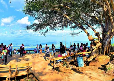 a group of people on a swing at the beach at Hotel Five Stars sv in Berlín