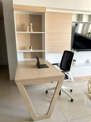a desk with a laptop and a chair in a room at Upper Scale and Cozy Apart in the Heart of Escalon in San Salvador