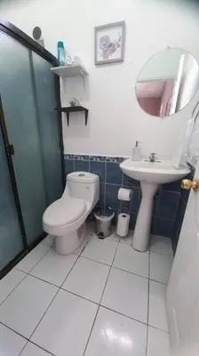 a bathroom with a toilet and a sink at Marron House's Arizona 2 in Santa Ana