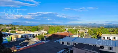 an aerial view of a small town with buildings at San Salvador Mountain & City Views Apartment in San Salvador