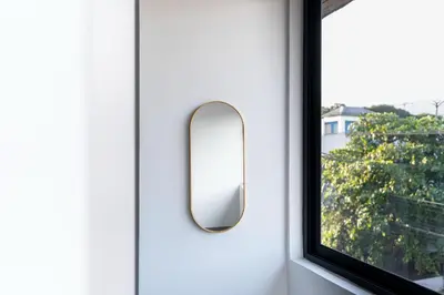 a mirror on a door with a window at Luxury apartment at Galerias in San Salvador
