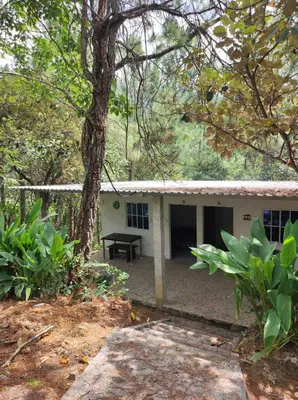 a house with a picnic table in front of it at Casa Campo Loma Larga in La Palma