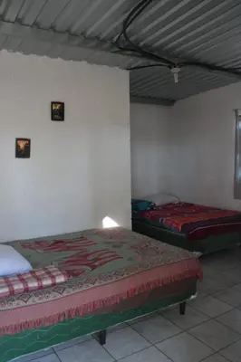 a bedroom with two beds in a room at Casa Campo Loma Larga in La Palma