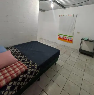 a room with a bed in a room with a basketball at Casa Campo Loma Larga in La Palma