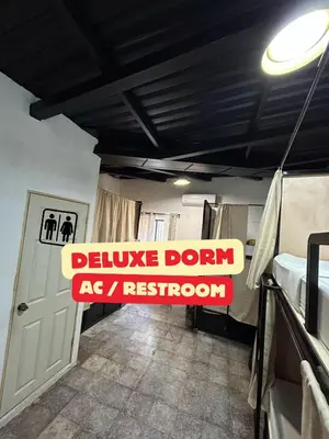 a sign that says disable dont as restroom in a room at Urban Nest Hostel in Santa Ana