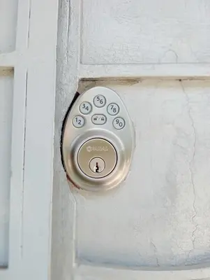 a door with a silver door knob on a door at Double Bed in San Salvador