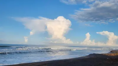 a view of the ocean with a cloudy sky at Rancho Joya Del Mar in Sonsonate