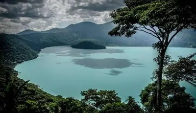 a view of a large lake in the mountains at Antique Luna in Santa Ana